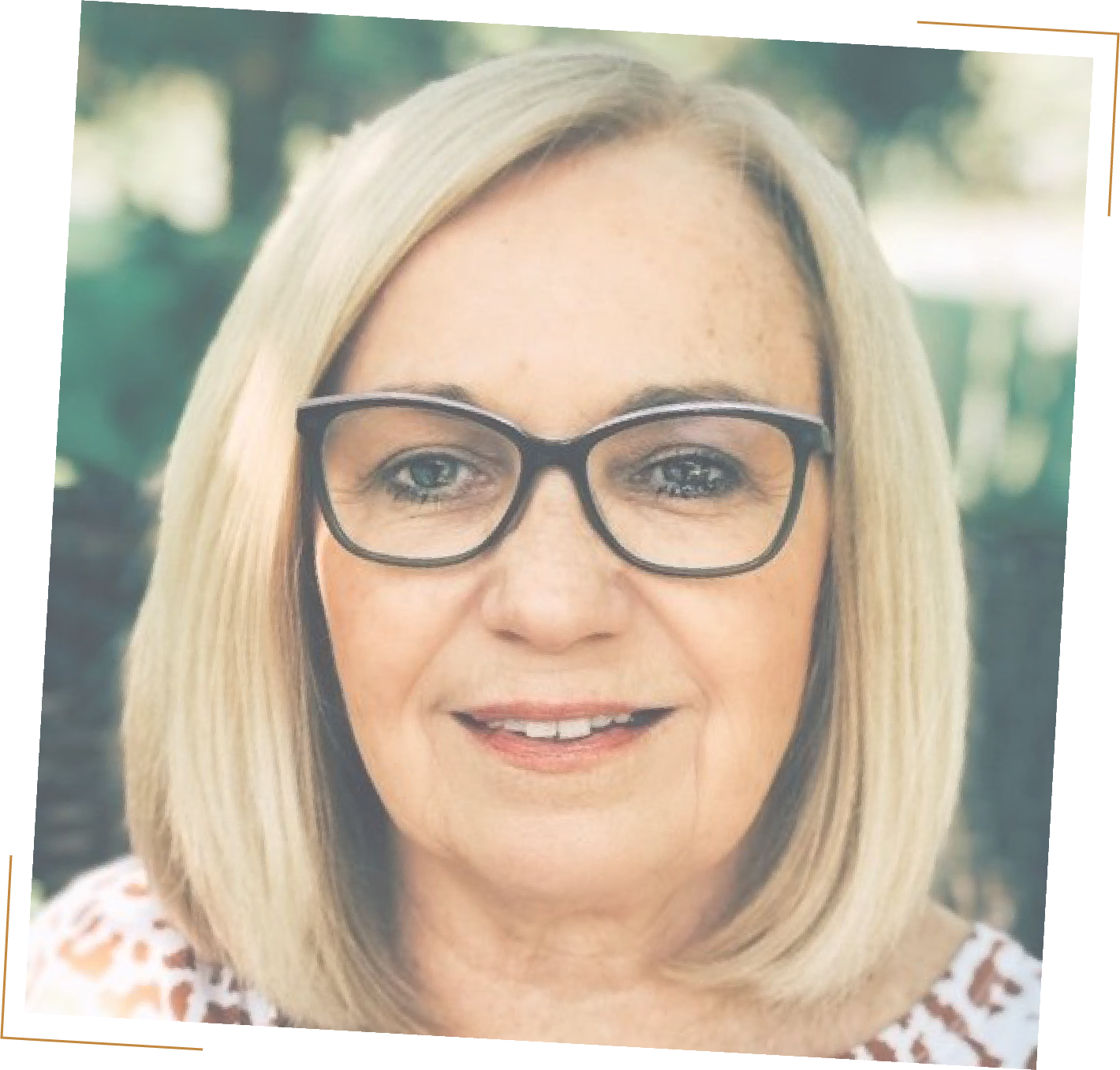 blond woman with short hair wearing glasses and smiling | Lisa Bond Coaching | DBT skills and solutions for borderline personality disorder and high emotional sensitivity